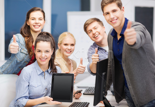 students with monitor and blank tablet pc screen Stock photo © dolgachov