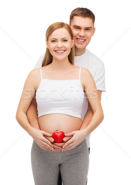 Szczęśliwy młodych rodziny dziecko serca ciąży Zdjęcia stock © dolgachov