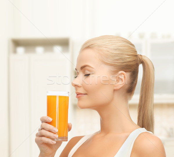 Mulher jovem potável suco de laranja comida saúde dieta Foto stock © dolgachov
