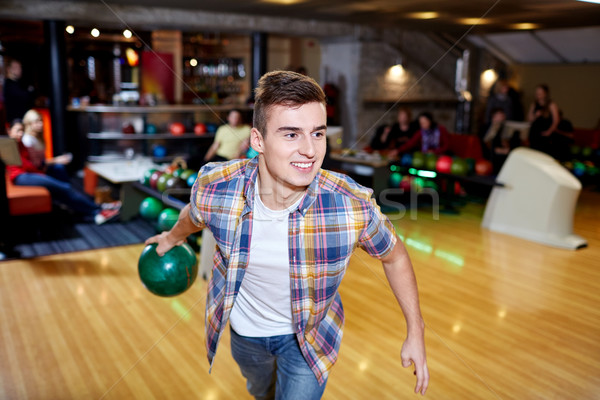 [[stock_photo]]: Heureux · jeune · homme · balle · bowling · club