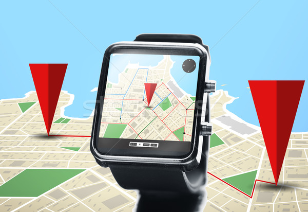 close up of smartwatch with navigator map Stock photo © dolgachov