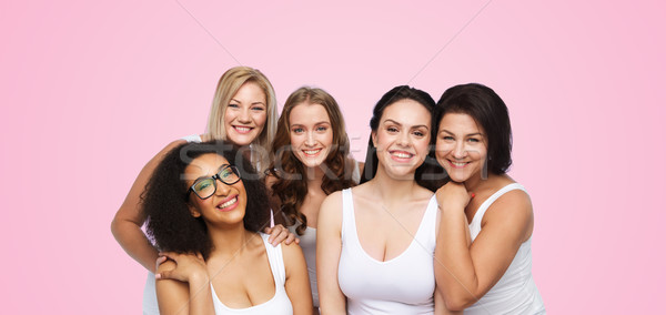 Grupo feliz diferente mujeres blanco ropa interior Foto stock © dolgachov