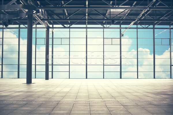 airport terminal room over blue sky and clouds Stock photo © dolgachov