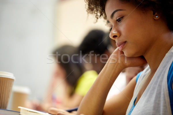 close up of african student girl on lecture Stock photo © dolgachov