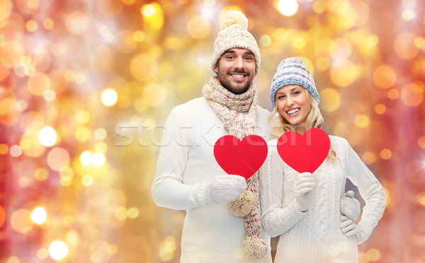 Sonriendo Pareja invierno ropa rojo corazones Foto stock © dolgachov