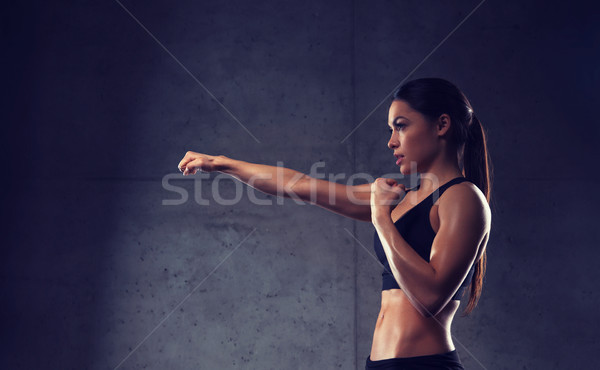 woman boxing in gym Stock photo © dolgachov