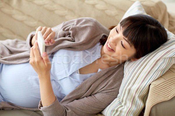 Foto d'archivio: Felice · donna · incinta · smartphone · home · gravidanza · maternità