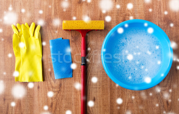 squeegee with window cleaning stuff on wood Stock photo © dolgachov