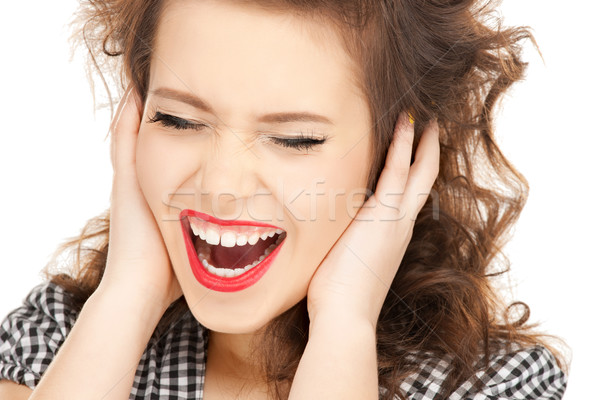 woman with hands on ears Stock photo © dolgachov