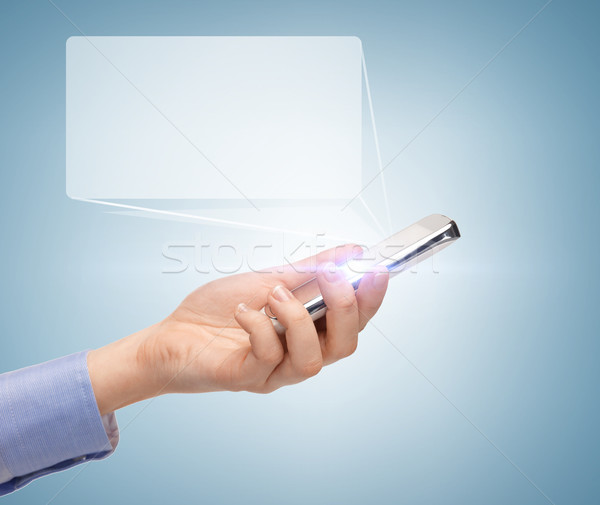 man hand with smartphone and virtual screen Stock photo © dolgachov