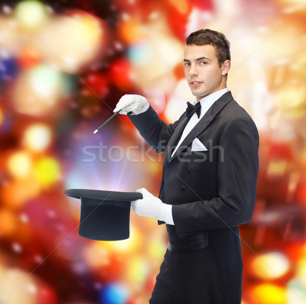 Bűvész felső kalap varázspálca mutat trükk Stock fotó © dolgachov