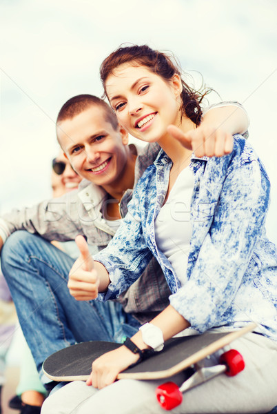 teenages with skateboard outside Stock photo © dolgachov