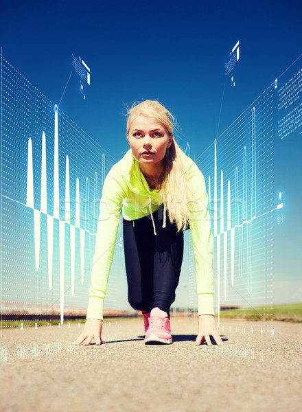 concentrated woman doing running outdoors Stock photo © dolgachov