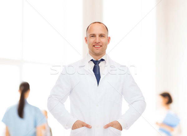 Sorridere medico di sesso maschile bianco cappotto sanitaria professione Foto d'archivio © dolgachov