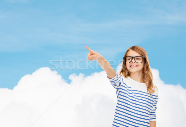 Aranyos kislány szemüveg mutat levegő oktatás Stock fotó © dolgachov