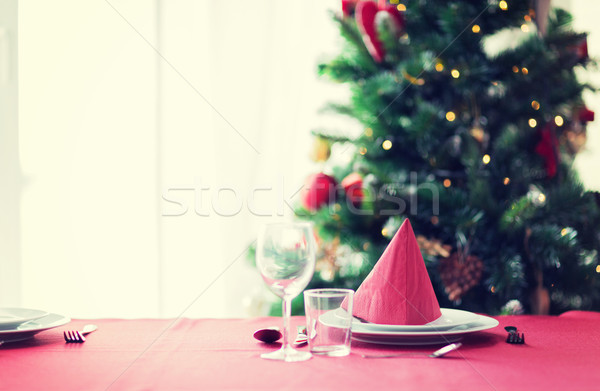 room with christmas tree and decorated table Stock photo © dolgachov