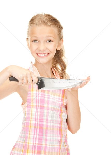 little housewife with knife Stock photo © dolgachov