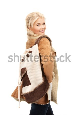 beautiful woman in sheepskin jacket Stock photo © dolgachov