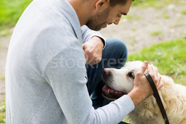 close up of man with labrador dog outdoors Stock photo © dolgachov
