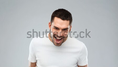 öfkeli adam gri duygu zulüm öfke Stok fotoğraf © dolgachov