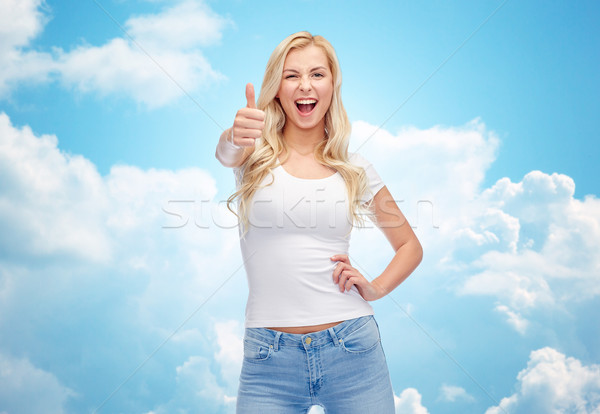 Heureux jeune femme adolescente blanche tshirt passions [[stock_photo]] © dolgachov