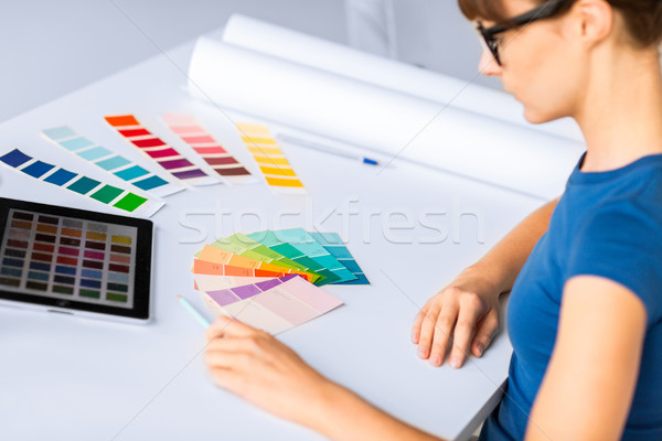 woman working with color samples for selection Stock photo © dolgachov