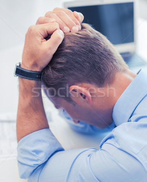 stressed businessman at work Stock photo © dolgachov