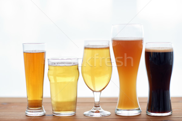 close up of different beers in glasses on table Stock photo © dolgachov