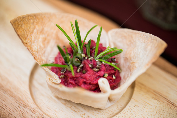 close up of dough cornet with beetroot filling Stock photo © dolgachov