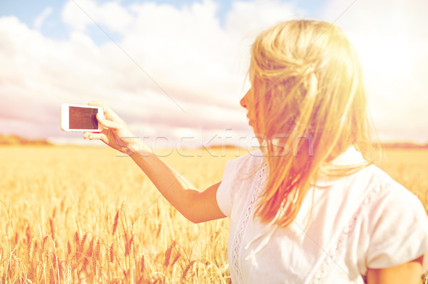 девушки смартфон зерновых области природы Сток-фото © dolgachov