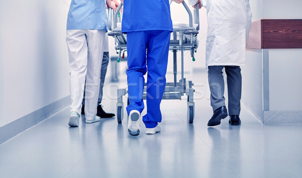 medics carrying hospital gurney to emergency room Stock photo © dolgachov