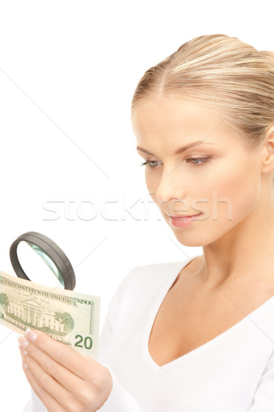 Mujer lupa dinero cara femenino blanco Foto stock © dolgachov