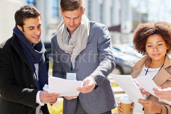 international business team with papers outdoors Stock photo © dolgachov