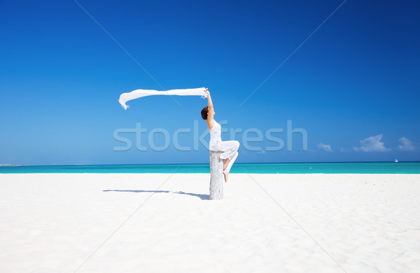 happy woman on the beach Stock photo © dolgachov