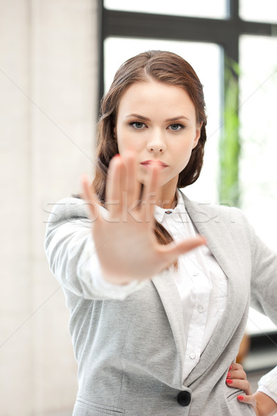 woman making stop gesture Stock photo © dolgachov