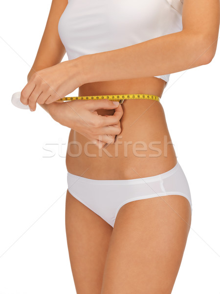 Mulher fita métrica quadro corpo saúde Foto stock © dolgachov