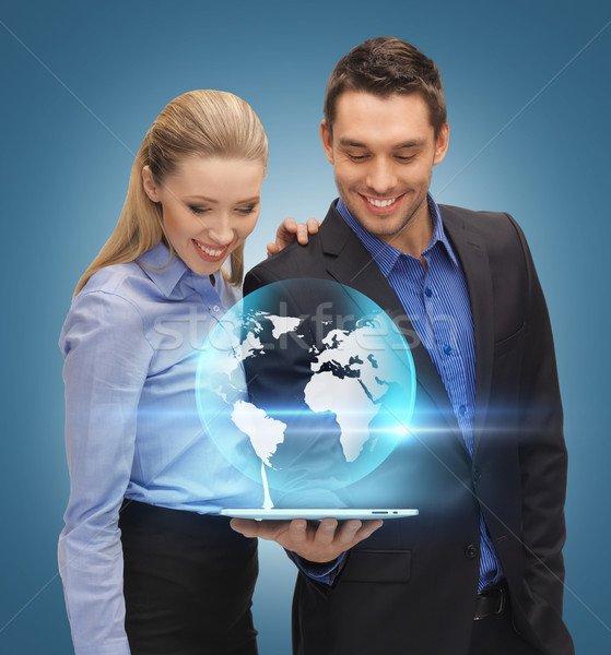 man and woman with tablet pc Stock photo © dolgachov