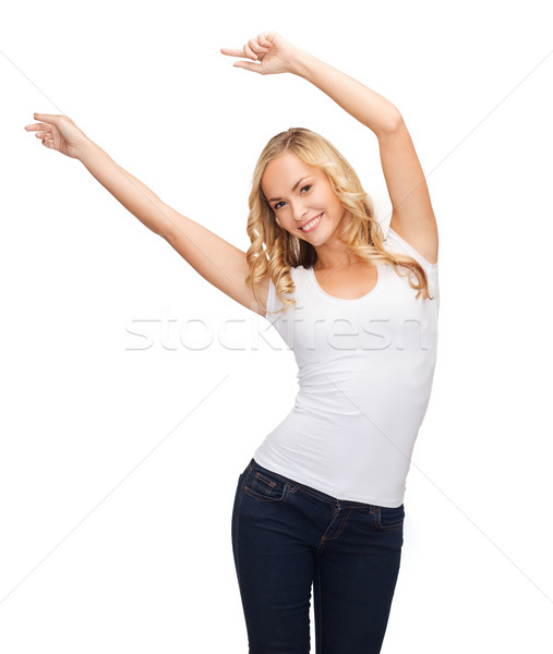 happy dancing woman in blank white t-shirt Stock photo © dolgachov