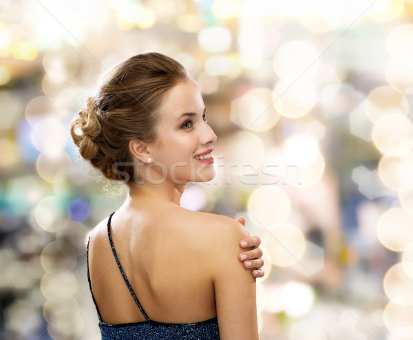 Сток-фото: улыбающаяся · женщина · вечернее · платье · люди · праздников · гламур · черный