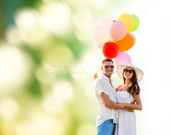 Sonriendo Pareja aire globos aire libre amor Foto stock © dolgachov