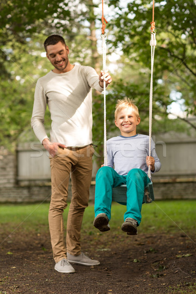 happy family in front of house outdoors Stock photo © dolgachov