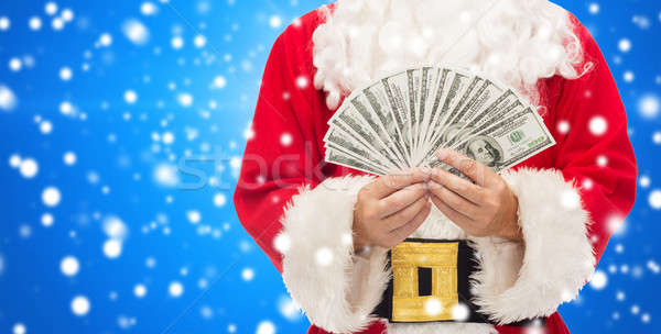 close up of santa claus with dollar money Stock photo © dolgachov