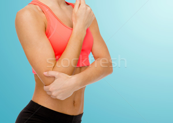 Kadın ağrı dirsek sağlık uygunluk Stok fotoğraf © dolgachov