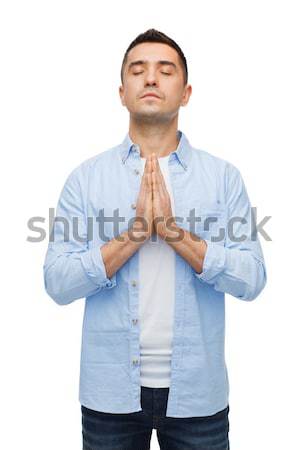 happy man praying Stock photo © dolgachov