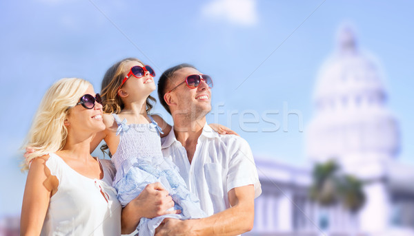happy family over american white house background Stock photo © dolgachov