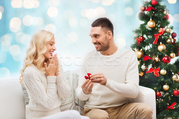 Férfi nő eljegyzési gyűrű karácsony szeretet pár Stock fotó © dolgachov
