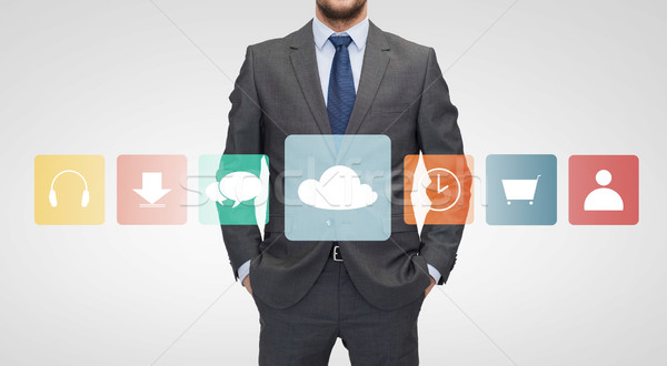 close up of businessman in suit with menu icons Stock photo © dolgachov