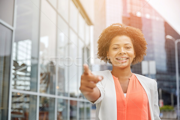 happy young african american businesswoman in city Stock photo © dolgachov