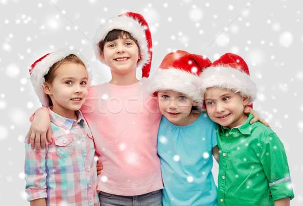 Szczęśliwy mały dzieci Święty mikołaj Zdjęcia stock © dolgachov