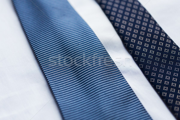 close up of shirt and blue patterned ties Stock photo © dolgachov